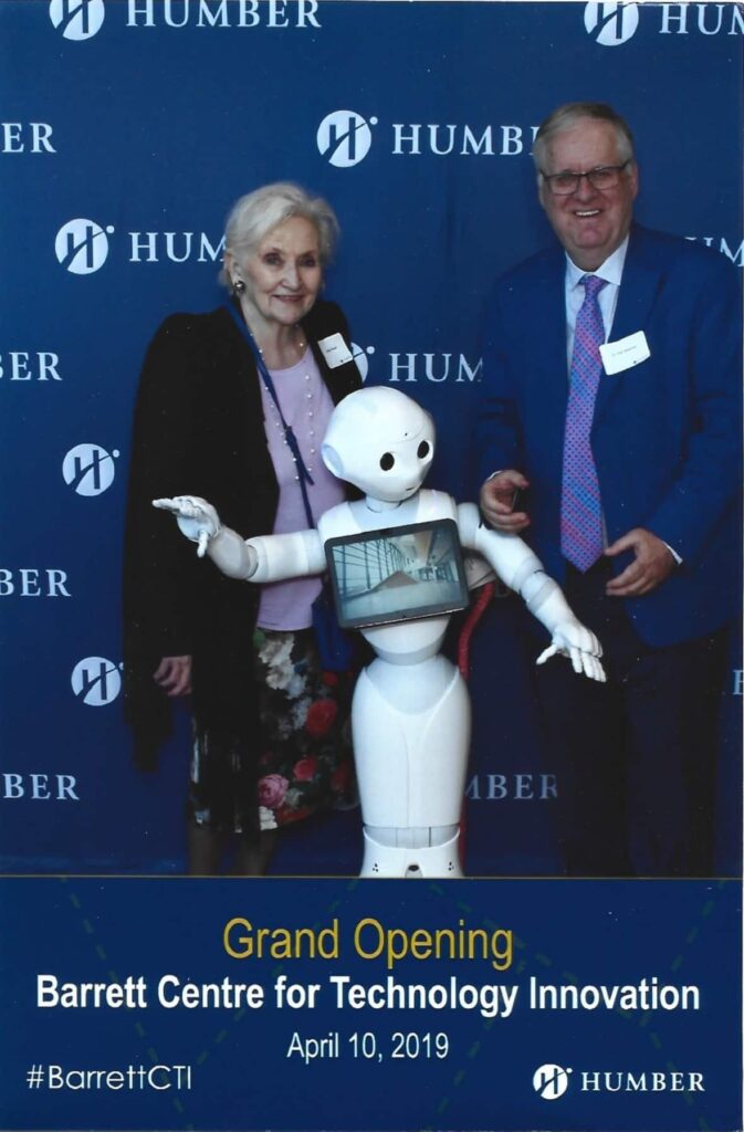 Dan and Leona with a Robot